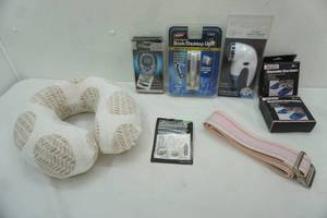 lot 70 image: Fabric Shaver, Neck Pillow, Book Light, Safety Belt and More