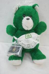lot 72 image: Vintage 1984 Pioneer Seeds Paw Pals Green & White Teddy Bear, Vintage Pioneer Seeds Playing Cards, ad Pocket Knife