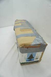 lot 80 image: 4ft. Augustan Spruce. Multi-Colored Lights