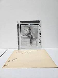 lot 95 image: 1961 Elvgren Pin-Up Girl on Roof Pre-Production Glass Printing Plate