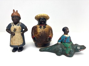 lot 136 image: Group of Cast Iron Figural Coin Banks