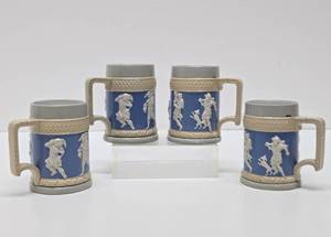 lot 294 image: Set of 4 Antique METTLACH Villeroy & Boch German Beer Tankards