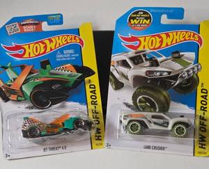 lot 79 image: Hot Wheels HW OFF-ROAD Land Crusher and Jet Threat 4.0