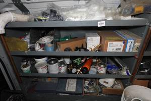 lot 320 image: Contents of Shelf - O-Rings, Faucet, Chemicals, Tape