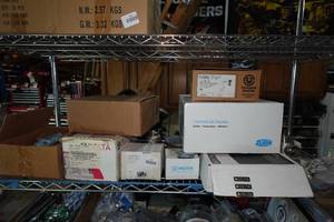 lot 407 image: Contents of Shelf - Faucet Parts, Motorized Valve