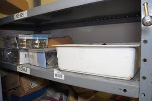 lot 260 image: Contents of Shelf - Tub and Shower Kits, Nuts