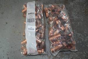 lot 396 image: 50 Copper Tee 34 Fittings
