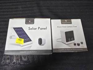 lot 77 image: Wasserstein Solar Charging Panel and Alarm Clock Camera Case