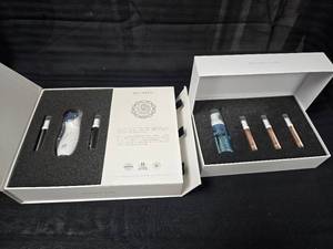 lot 97 image: New Juvinesse Electro Stimulation Facial Rejuvenation Kit with Refill Kit