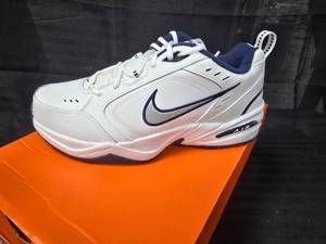 lot 126 image: New Pair of Nike Air Monarch IV Training Shoes, Winning Bidder can Choose Between Size 10 or Size 11