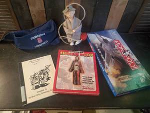 lot 32 image: Lot of Unique Collectables Union Pacific Fanny Pack, Gag Flasher Doll, Monopoly and more