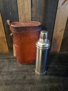 lot 45 image: Early 20th Century Metal Thermos in Leather Carry Case