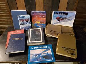 lot 47 image: Large Lot of Aviator Manuals Flight Books and History of Vintage Planes