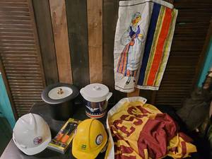 lot 56 image: Collection of hardhats Icebuckets Huge UofM flag and more