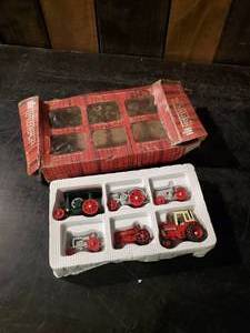 lot 72 image: ERTl International Harvester Historical Toy Tractor Set