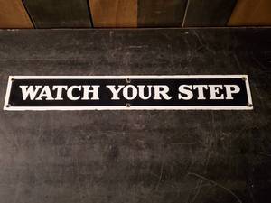 lot 89 image: Authentic 21 inch Porcelan Train Car Sign Watch your Step