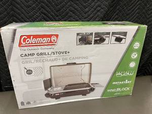 lot 4 image: Coleman Camp GrillStove with Instastart and Wind Block Panels
