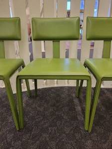 A set of 4 Maria Yee Chairs.
