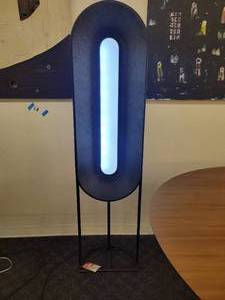 lot 9 image: A modern Race Track Floor Lamp by Maria Yee.