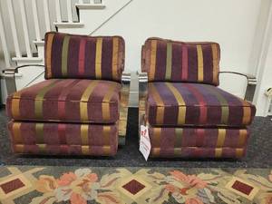 lot 14 image: A pair of modern armchairs by Swaim.