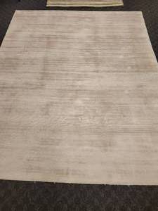 lot 15 image: 8 x 10 Light Pink Rug. 100% Viscose.