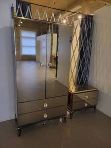 lot 29 image: Bedroom set by Ello. Queen Bed, Armoire & Nightstand.