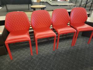 lot 32 image: A set of 4 Red Dumbo Chairs by Miniforms.