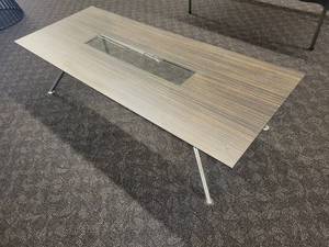 lot 33 image: Modern Cocktail Table with a wood grain design, inset glass panel and chrome legs. Made by Fjords Furniture of Norway.