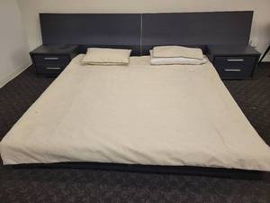 lot 41 image: King Bed with 2 Nightstands, Duvet Cover & Shams.