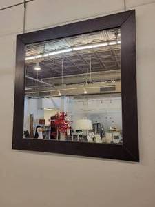 lot 67 image: A Caligaris Wood Framed Mirror.