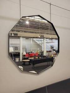 lot 68 image: A Ten Sided Mirror. Matt Metal Frame.