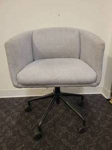 lot 70 image: Gus Modern Radius Swivel Task Chair in Granite Fabric.