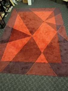 lot 73 image: Geometric Diamond Shaped Wool Rug. 7 9 x 10 4.