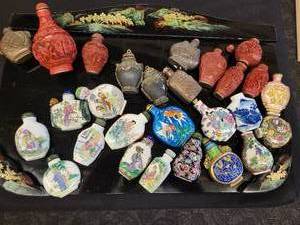lot 110 image: A lot of 27 Snuff Bottles. 8 bottles are missing their stops. Cinnabar. Painted. Etc.