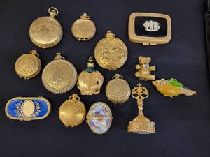 lot 111 image: A collection of 14 Solid Perfumes.