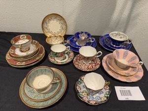lot 140 image: A set of 9 China Cups & Saucers, some with underplates.