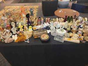 lot 142 image: A table full of Porcelain Shoes, Figurines, Music and plain Boxes, Collectibles etc.