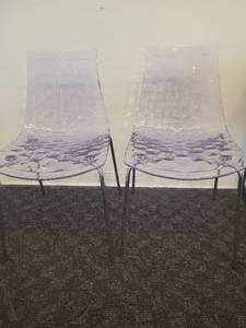 lot 144 image: A pair of Calligaris Ice Chairs.