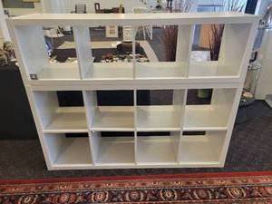 lot 147 image: A 2 piece, 12 cubby wood storage unit in white.