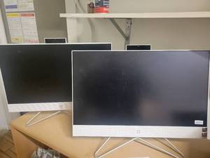 lot 153 image: 2 All In One HP Desktop Computer Monitor.