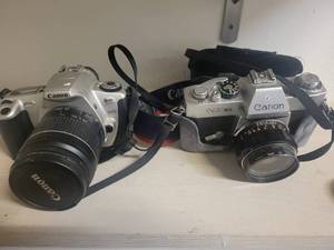 lot 154 image: 2 Cameras Canon Rebel 2000 EOS & Canon EX Auto with lenses.