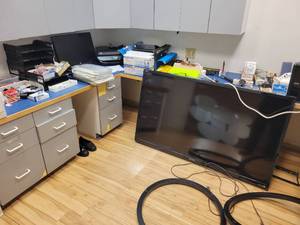 lot 158 image: Everything you see in these pictures.TV, Printer, Power Battery Backup, Office Supplies, Security Cameras etc.