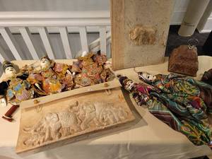 lot 171 image: A collection of Asian themed  Items Puppets, Photo Albums and Decor items.