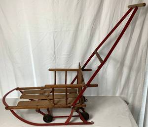 lot 8 image: Antique Steel Runer Sled with Drop Down Wheels and Adjustable Push Handle from K Baby