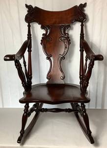 lot 4 image: Stickley and Brandt Ornate Victorian-era Hand Carved Rocking Armchair - circa 1900