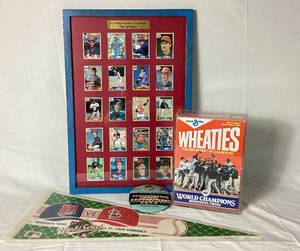 lot 104 image: Minnesota Twins 1987 World Series Bundle - Framed Team of Destiny Baseball Card Set, Pendant, Wheaties Box and Collector Button