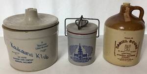 lot 46 image: Vintage Kaukauna Cheese Stoneware Crocks and Daniel Boone Whiskey Pioneer Jug