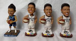 lot 105 image: Minnesota Lynx Katie Smith and Janel McCarville Bobbleheads