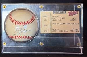 lot 49 image: Minnesota Twins Eric Milton Autographed Baseball with Ticket from His No Hitter September 11, 1999 Game