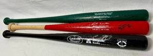 lot 140 image: Minnesota Twins Autographed Commerative Baseball Bats - Marty Cordova, Matt Lawton and Cristian Guzman